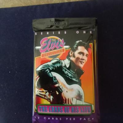 FOUR SEALED PACKS OF ELVIS TRADING CARDS