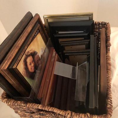 Large basket full of picture frames -Lot 273