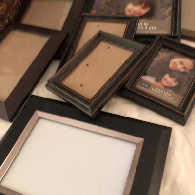 Large basket full of picture frames -Lot 273