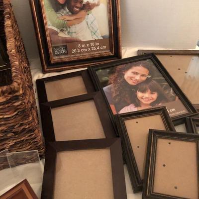 Large basket full of picture frames -Lot 273