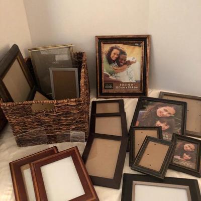 Large basket full of picture frames -Lot 273