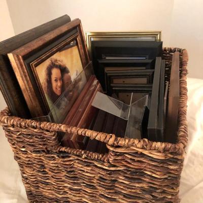Large basket full of picture frames -Lot 273