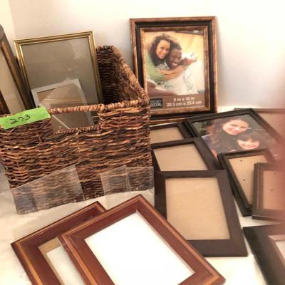 Large basket full of picture frames -Lot 273