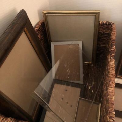 Large basket full of picture frames -Lot 273