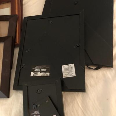 Large basket full of picture frames -Lot 273