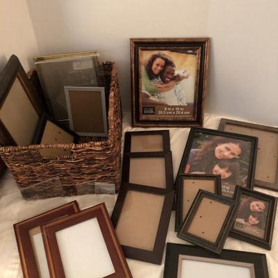 Large basket full of picture frames -Lot 273