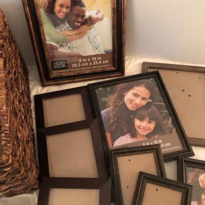 Large basket full of picture frames -Lot 273