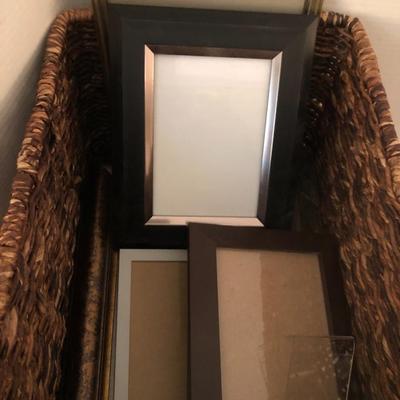 Large basket full of picture frames -Lot 273