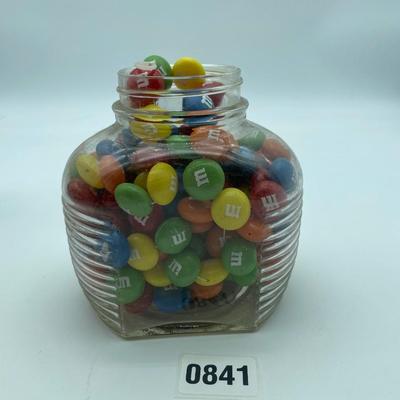 String of M&Mâ€™s in a cool jar