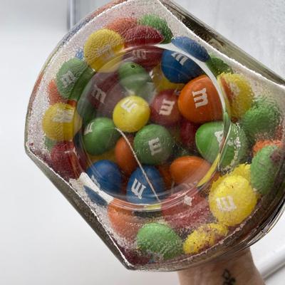 String of M&Mâ€™s in a cool jar