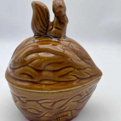 Ceramic vintage squirrel on walnut