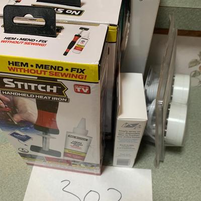 New In Box Household Products Lot Universal Remote Heat Irons Halogen Lites