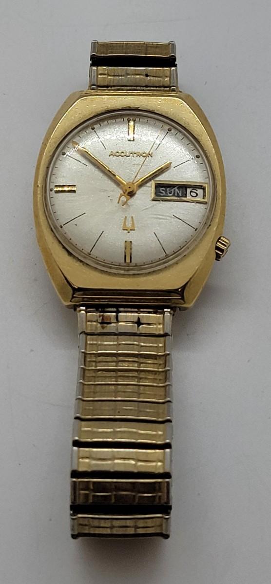 Bulova accutron 14k gold case sale