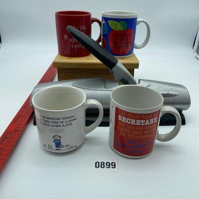 Coffee mugs,3 hole puncher, yardstick