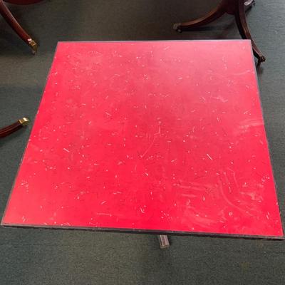Lot 350 | Mid-Century Chrome and Red Table