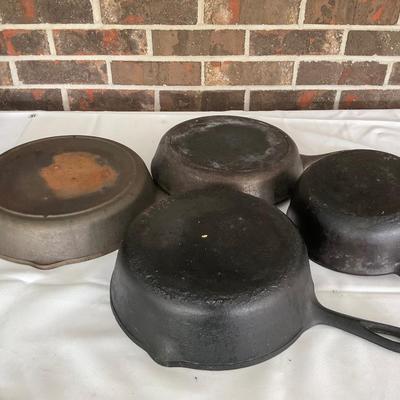 Four Cast Iron Pans