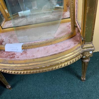 Lot 513 | Gold Curved Front Vitrine