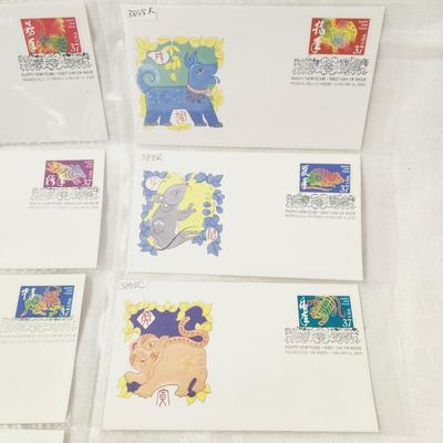 12 - FIRST DAY STAMPS - CHINESE NEW YEAR 2005