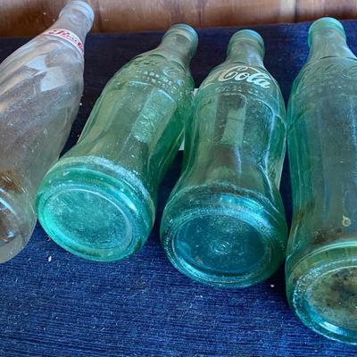 Vintage Coke and Pepsi Bottles
