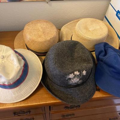 Lot of vintage hats and belts