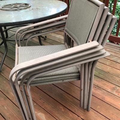 Round Patio Table & 4 Stackable Chairs -Lot 410