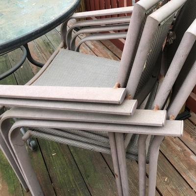 Round Patio Table & 4 Stackable Chairs -Lot 410