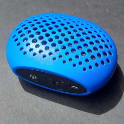 Gumy earphones, I-Phone Emergency Phone Charger and a blue tooth speaker
