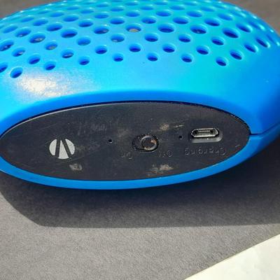 Gumy earphones, I-Phone Emergency Phone Charger and a blue tooth speaker