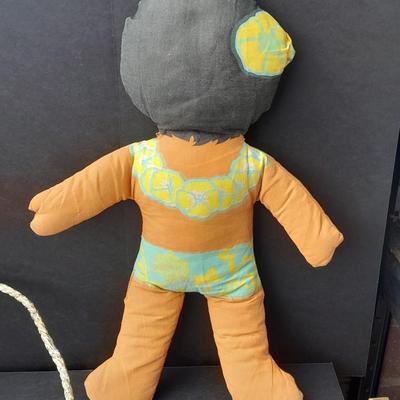 Two Vintage Hawaiian Huggables cloth dolls and an Indonesian Fish wind chime
