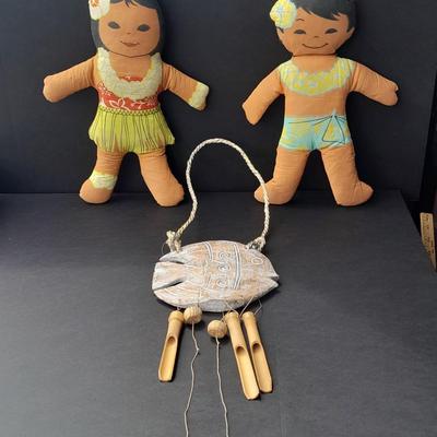 Two Vintage Hawaiian Huggables cloth dolls and an Indonesian Fish wind chime