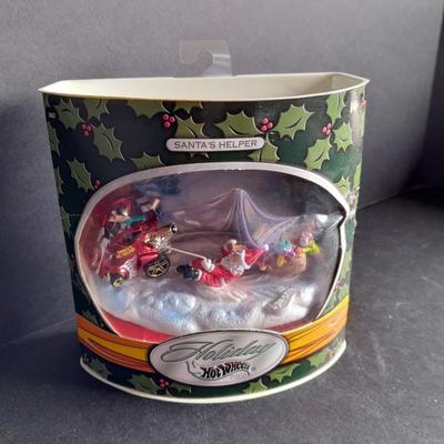 Holiday Hot wheels 2002 Santa's Helper Collectable still in the box!
