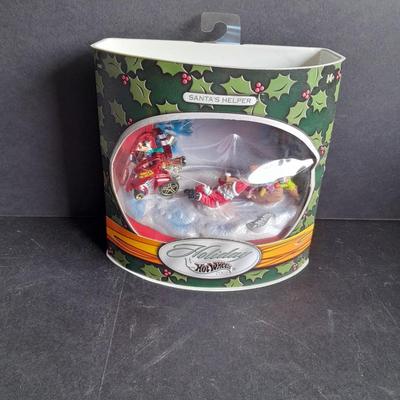 Holiday Hot wheels 2002 Santa's Helper Collectable still in the box!