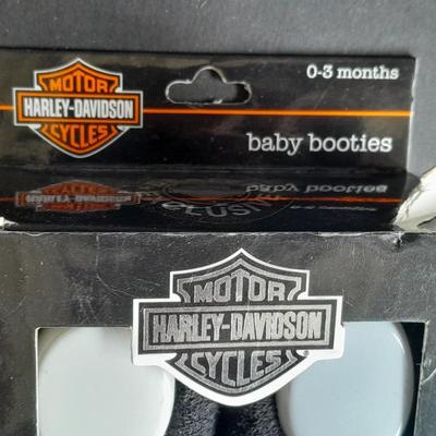 Harley Davidson Baby Booties 0-3 months and a Harley pig on Motorcycle figure