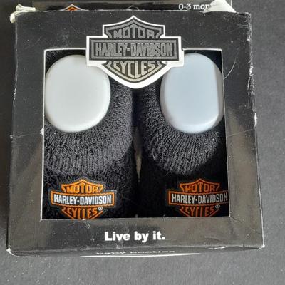 Harley Davidson Baby Booties 0-3 months and a Harley pig on Motorcycle figure
