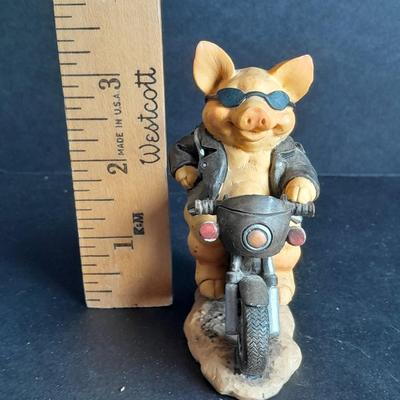 Harley Davidson Baby Booties 0-3 months and a Harley pig on Motorcycle figure