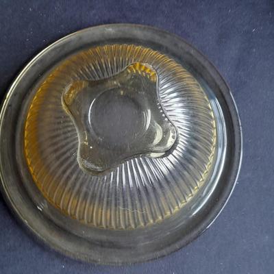 Two nesting Yellow Federal depression glass mixing bowls with wide rims