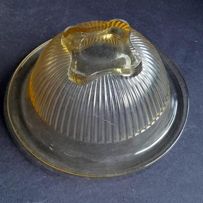 Two nesting Yellow Federal depression glass mixing bowls with wide rims