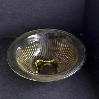 Two nesting Yellow Federal depression glass mixing bowls with wide rims