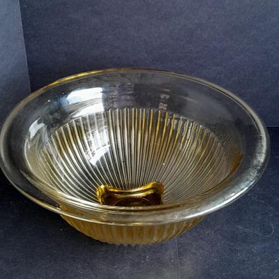 Two nesting Yellow Federal depression glass mixing bowls with wide rims