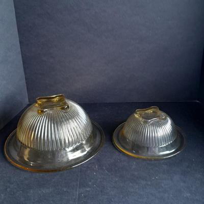 Two nesting Yellow Federal depression glass mixing bowls with wide rims