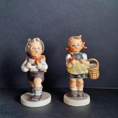 Two W. Goebel West Germany School boy and School girl Hummel figures