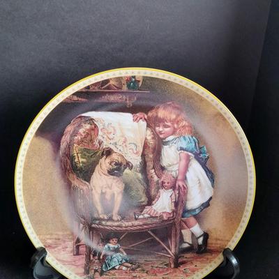 Two Collectible plates with Certificates of Authenticity "Pugnacious Playmate" and "Rose Cottage"