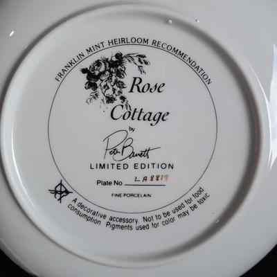 Two Collectible plates with Certificates of Authenticity "Pugnacious Playmate" and "Rose Cottage"