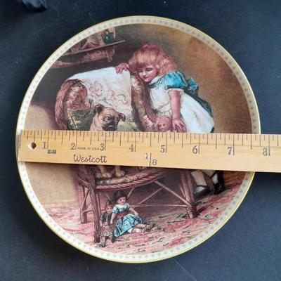 Two Collectible plates with Certificates of Authenticity "Pugnacious Playmate" and "Rose Cottage"