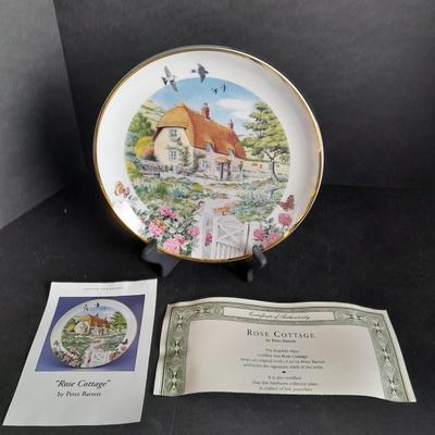 Two Collectible plates with Certificates of Authenticity "Pugnacious Playmate" and "Rose Cottage"