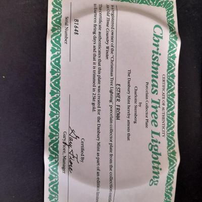 Two Collectible plates with Certificates of Authenticity "Christmas Tree Lighting" and "Twilight Serenade"