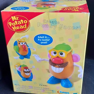 Mr. Potato Head and Gone Fishin' game, both appear brand new!