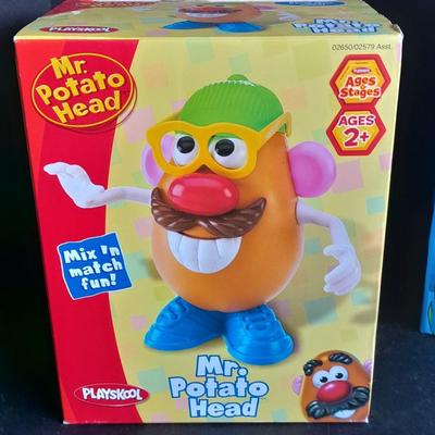 Mr. Potato Head and Gone Fishin' game, both appear brand new!