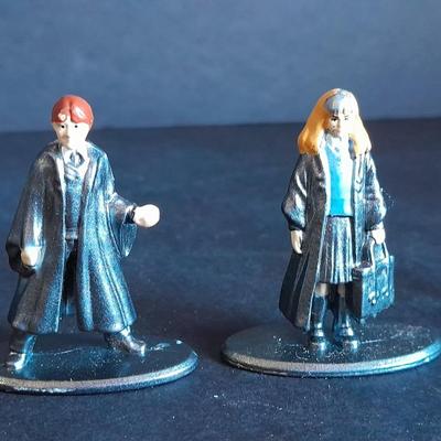 Harry Potter Sticker books and small metal figures and two keychains