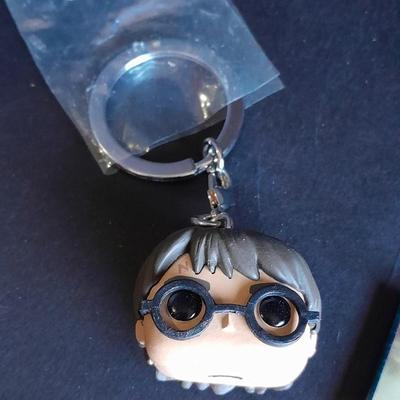Harry Potter Sticker books and small metal figures and two keychains